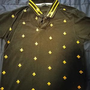 Black collared shirt with gold bee pattern